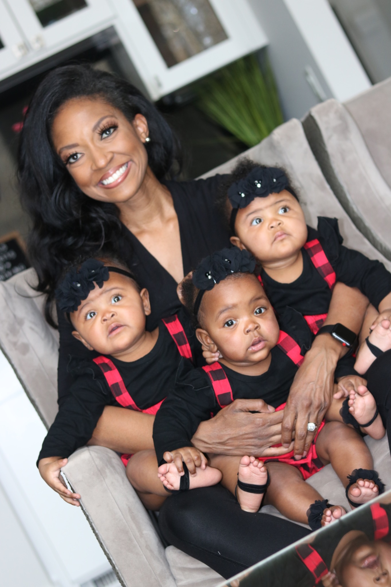 Marshawn Evans Daniels with her triplet daughters as babies.
